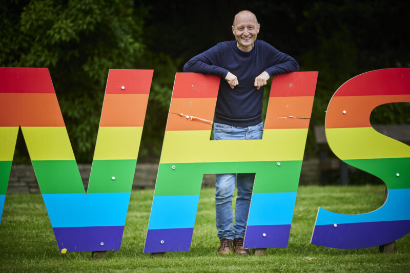 Paul Waugh with NHS sign