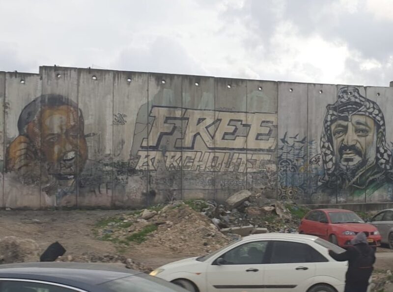 Graffiti in Ramallah of Marwan Barghouti and Yasser Arafat